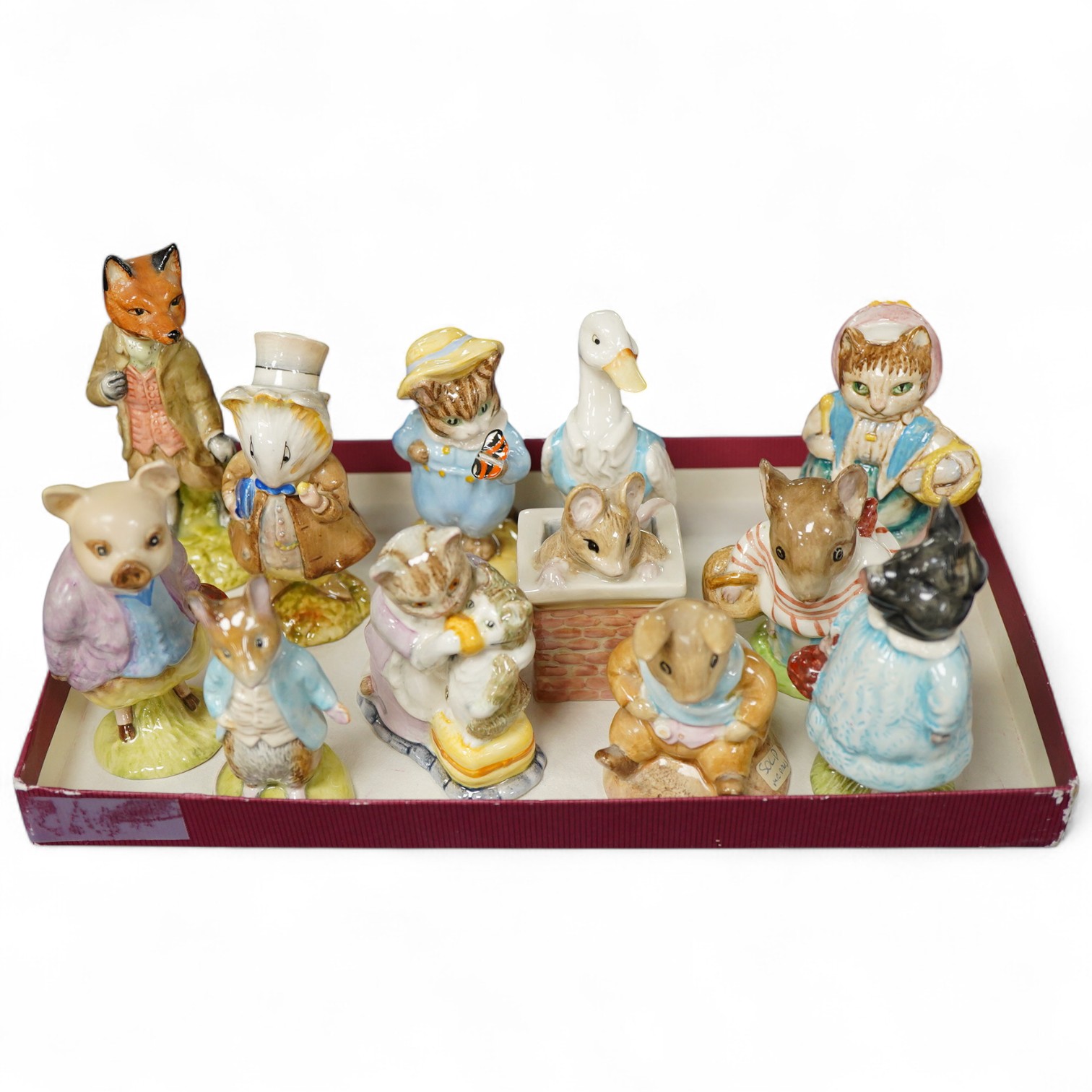 Twelve Beatrix Potter characters, stamp to base F Warne and Co Ltd. Beswick England